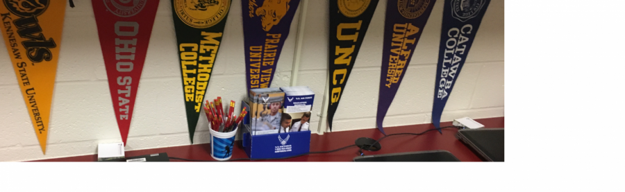 By attending the FCPS College Fair, you’ll be one step closer to having a college pennant of your own, just like these in Ms. Foster’s Career Center office.
(Photo by Adam Bihi)