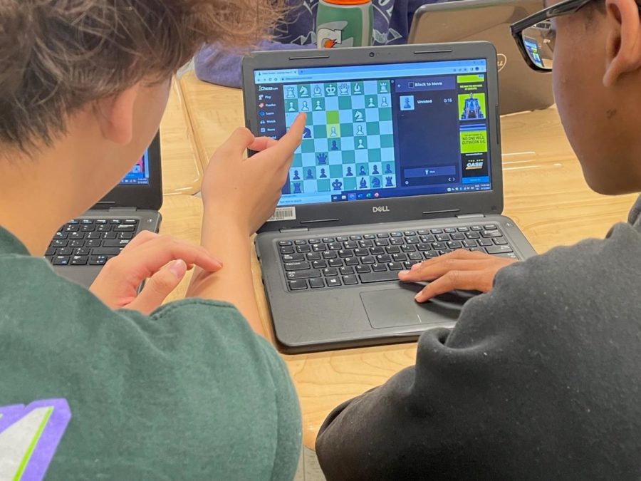 Thomas Nguyen (9) and Mutazim Elmi (9) play online chess together during some downtime in class.