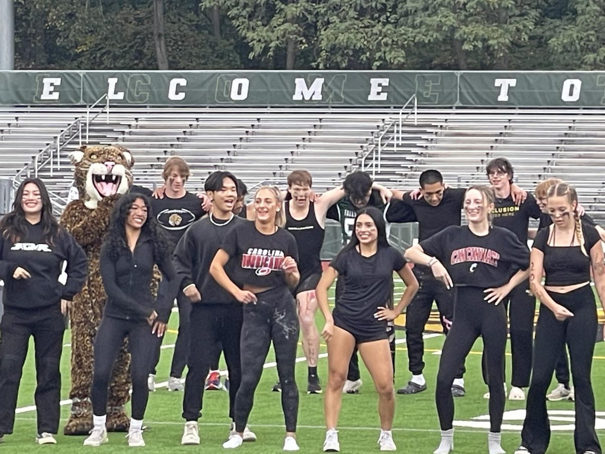 Seniors and the Jaguar dance during the class competition at the pep rally. Despite the rainy weather, the pep rally was packed with activities and competitions that allowed students to show their Jaguar spirit.  (Courtesy of Jennifer Beach)