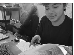Gabriel Penate-Zamora (11) and Alison Perez-Saavedra (11) get school work done. Advisory provided students and teachers with time to complete work, build bonds, and take a break.