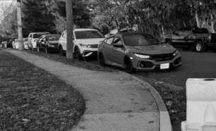 Students arrive very early to school to snag one of these coveted parking spots on Marc Drive. 
(Photo courtesy of Jennifer Beach)